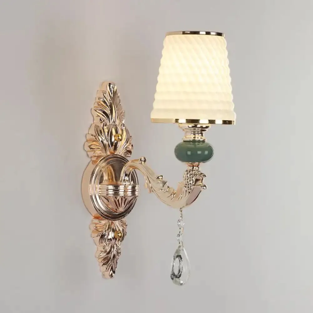 Classic Wall Mount Light with Textured Glass and Hanging Crystal in Gold