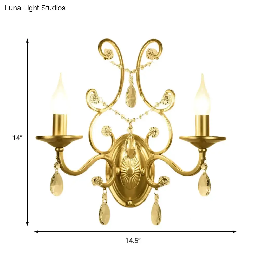 Contemporary Crystal Wall Sconce with Curved Arm and Brass Finish