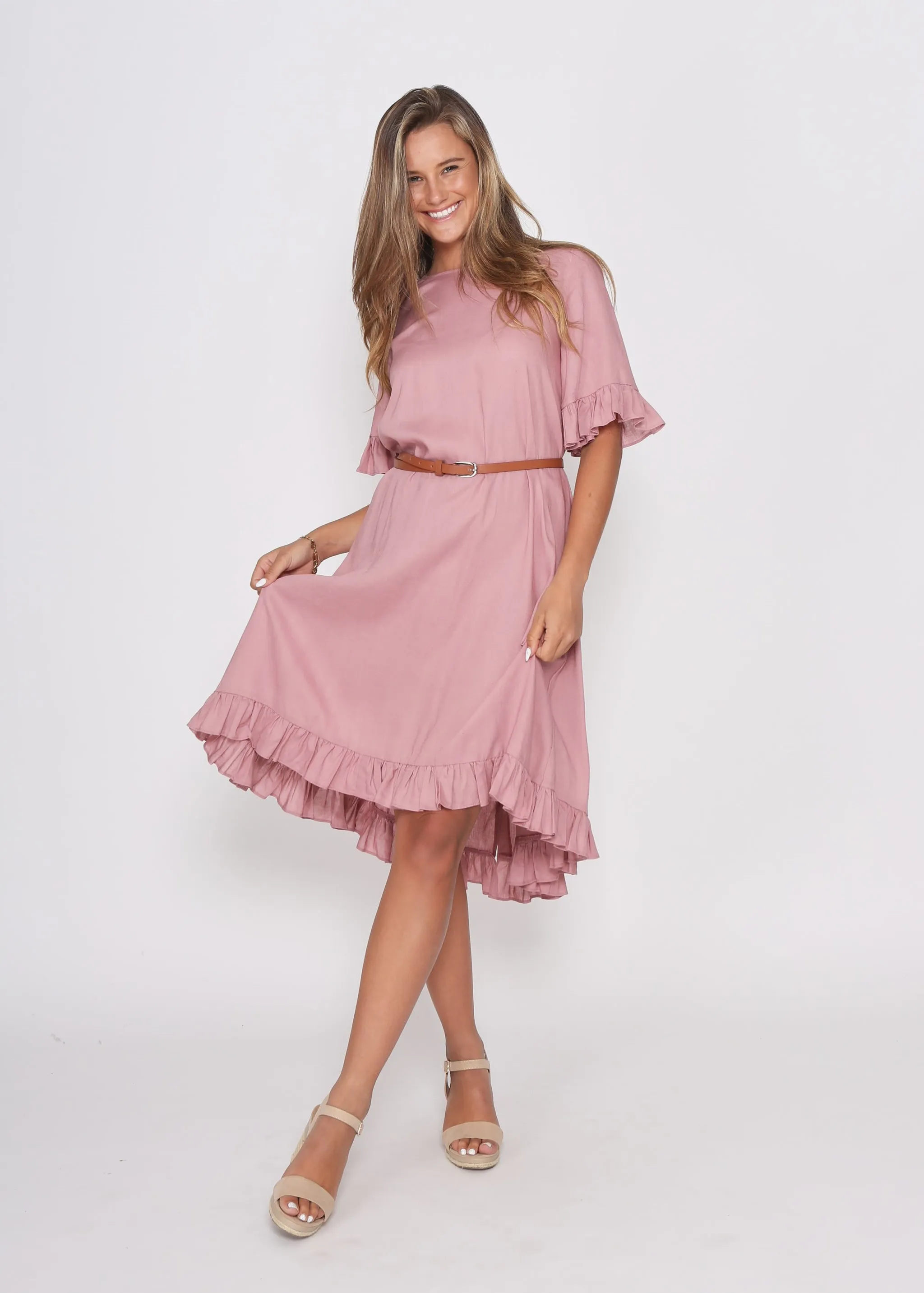 Dusky Pink Dress with pretty sleeve detail and hem line.