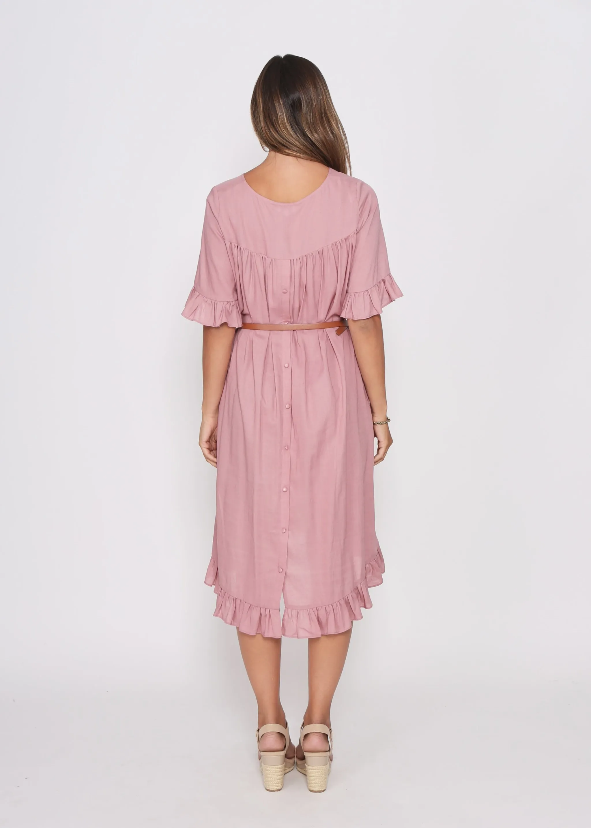 Dusky Pink Dress with pretty sleeve detail and hem line.