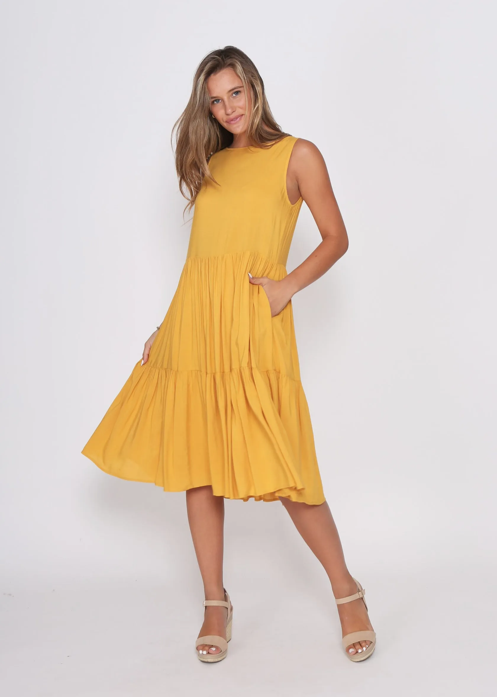 Mustard Dress fully Lined with side pockets.