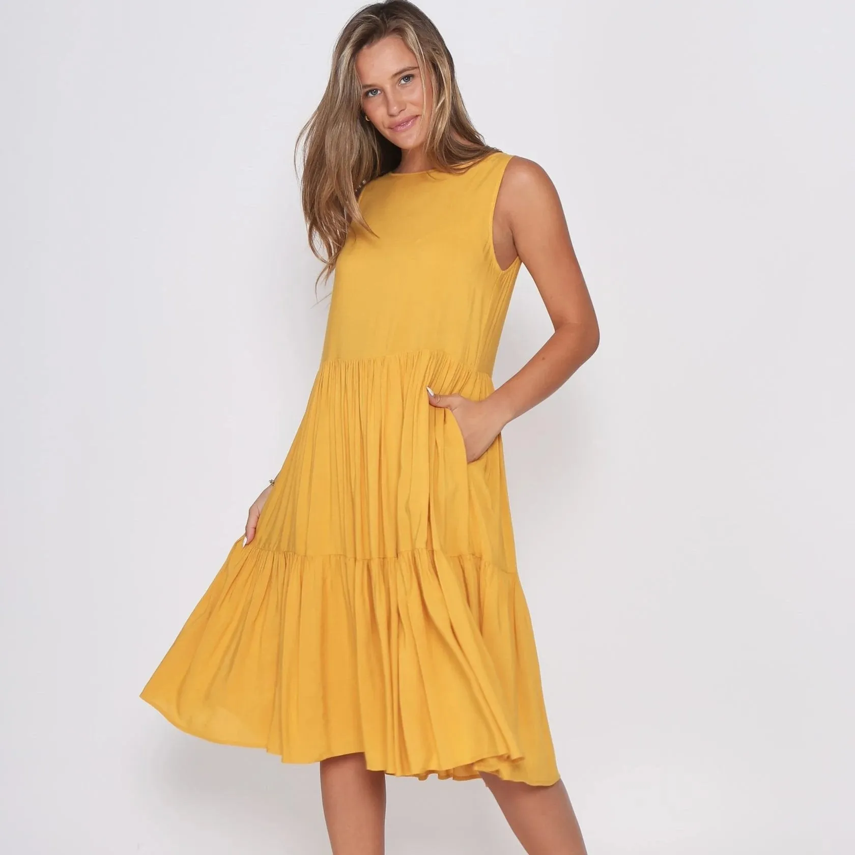 Mustard Dress fully Lined with side pockets.